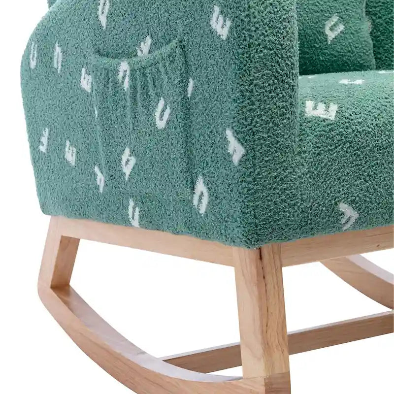 Groene, met bouclé gestoffeerde schommelstoel met hoge rugleuning en zijvak